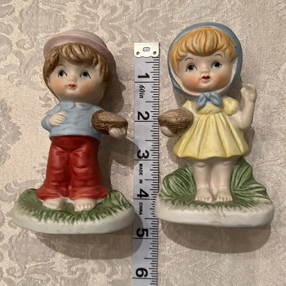 Vintage girl & boy porcelain figurines no chips cracks or discoloration EVC
